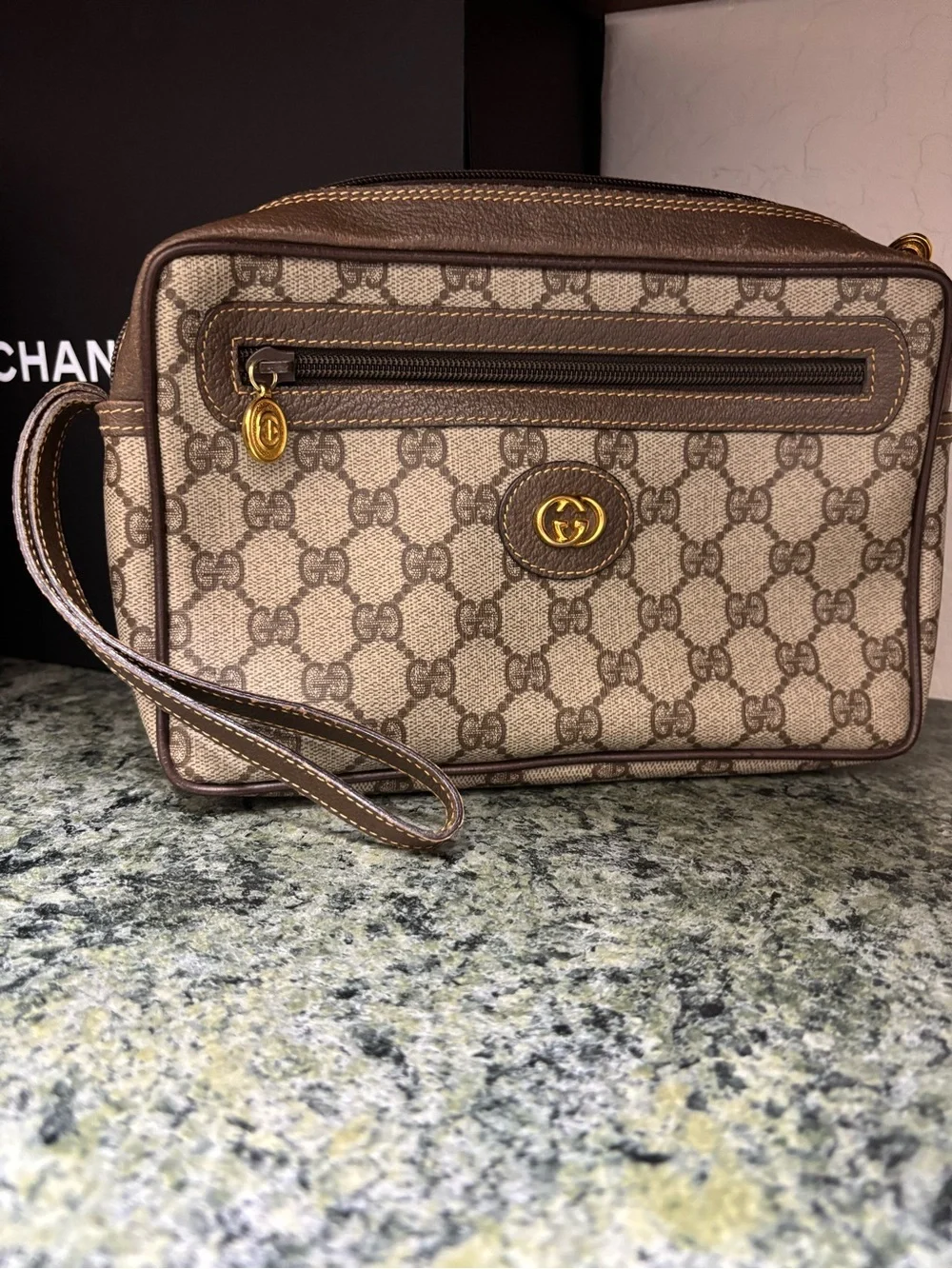 Gucci Beige Monogram wristlet with Gold Hardware. Great size!